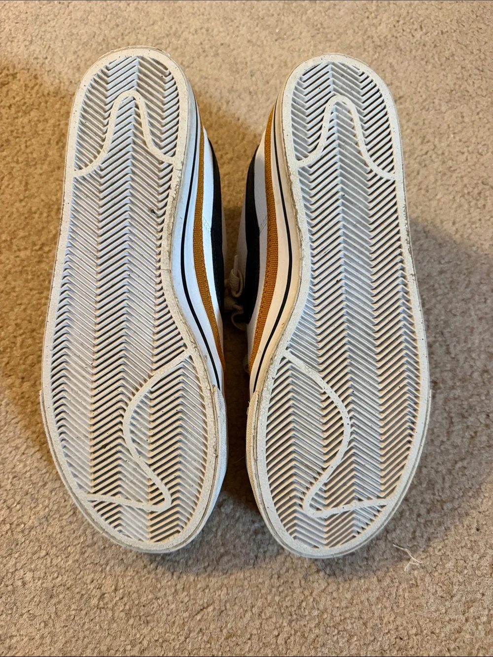 Nike Women’s White Sneakers with Black Swoosh and Tan Trim